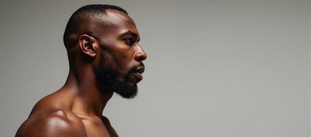 Detailed anatomical study depicts sideview profile of muscular African American man with accentuated veins photo