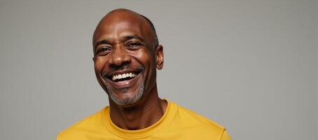 Middleaged African American man featuring a joyful expression on his face photo