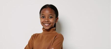 Young AfricanAmerican model confidently posed in brown turtleneck sweater on plain white backdrop photo