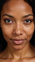 Closeup portrait of an African American woman with brown eyes gazing into the lens photo