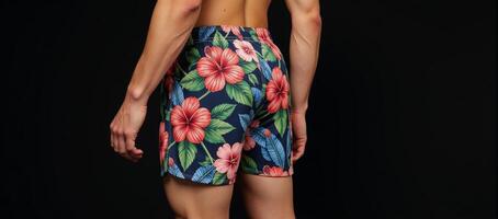Stylish vibrant hibiscusprinted floral shorts tropical design with an elastic waistband for both beach and casual outfits photo