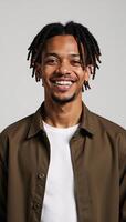 Cheerful Gen Z black man with dreadlocks exudes positive vibes and youthfulness in a vibrant image ideal for diversity inclusivity and modern youth representation photo