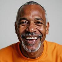 Middleaged African American man featuring a joyful expression on his face photo