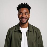 A cheerful contemporary studio portrait showcases an energetic AfricanAmerican young man photo