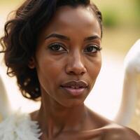 A beautiful AfricanAmerican angel portrayed with delicate features and graceful wings photo