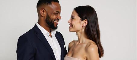 Smiling AfricanAmerican man gazes at woman in portrait setting photo