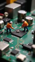 Creative miniature construction workers constructing microchip circuit board technology concept photo