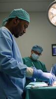 Side view illustration AfricanAmerican surgeon operating in hospital photo