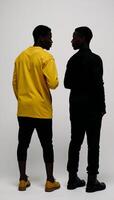 Blackandyellow silhouettes of African Americans people photo