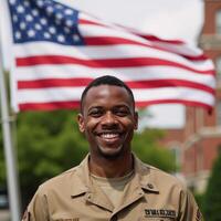 Joyful AfricanAmerican soldier smiling against a blurred American Flag backdrop photo