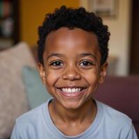 Closeup portrait of a happy African American boy radiating childlike charm in an inviting interior setting photo