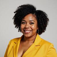 A stylish plussize woman with an afro flaunts trendy jumpsuit in art photo