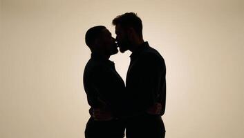 Concept Interracial gay couple on Valentines Day Asian and African American men expressing affection through an embrace in silhouette photo