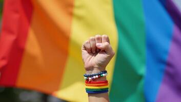 LGBTQ Pride Fist with Rainbow Hand on Flag Day Fight LGBTQ Flag Day photo
