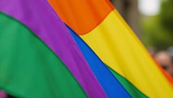 A colorful LGBT Rainbow Pride Flag with cheerful concepts of love unity and celebration photo