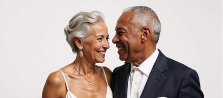 Portrait of smiling elderly African American couple on white background exudes affectionate connection photo