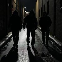 Shadows move through a rainsoaked dangerous urban landscape at night photo
