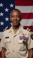 Elderly AfricanAmerican veteran salutes before U photo