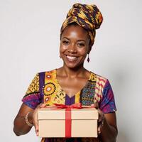 Smiling AfricanAmerican woman Coco with gift box and red tag featured in the People Series against a white backdrop photo
