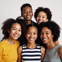 AfricanAmerican group smile happily against an isolated backdrop afros photo