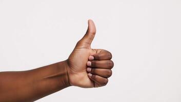 Isolated thumbup image featuring a smiling Black American hand photo