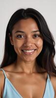 Portrait of an AfricanAmerican woman with a smile on a white backdrop Isolated photo