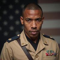 Angled view portrait of a determined AfricanAmerican solider in military uniform photo