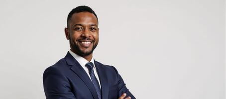 Isolated leadership portrait showcasing a confident senior African American businessman in a suit against a plain white backdrop photo