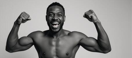 An energetic black activist raises his fists proudly photo