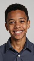 Smiling teenager with African American facial features photo