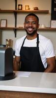 A portrait showcases a happy AfricanAmerican barista in uniform serving coffee with a smile photo