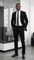 AfricanAmerican businessman portrayed with confidence in a modern office setting formal attire photo