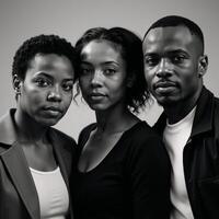 Portrait featuring three African American individuals in monochrome blackandwhite photo