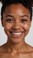 A joyous positive AfricanAmerican woman beaming with happiness captured in a captivating portrait photo