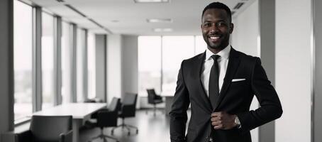 AfricanAmerican businessman portrayed with confidence in a modern office setting formal attire photo