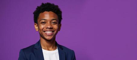 Confident African American teenager with a radiant smile poses in front of a purple studio background symbolizing education and youth with a dash of style photo