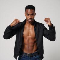 Exuberant Black male in fist pose photo