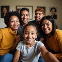 An African American family poses together for a home photo