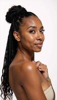 Portrait of an attractive Black African American woman in a 34 side view featuring a highdefinition image of her sharp jawline and perfect facial features against a white backdrop with curly long photo