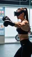 Female athlete trains virtually in modern gym with VR tech holograms photo