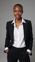 Portrait featuring a professional image of a gay black woman with a shavedhead buzzcut photo