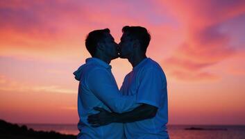 Two gay men share a heartfelt moment under synthwavecolored skies at dusk photo