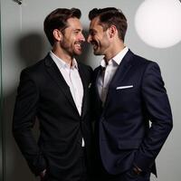 Exquisite studio portrait of gay couple using cinematic lighting against simple background photo