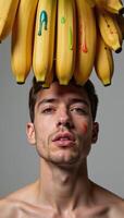 Rainbowcolored banana display showcasing a symbolic representation of gay love and pride set against a sensual mans face in the Tresome style photo