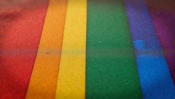 A grungystyle rainbow flag emblematic of LGBTQ Pride photo
