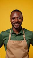 Portrait of a smiling black grocery store worker African American Male Also known as AfricanAmerican Grocery Store Worker Portrait Black Male Grocer Employee at Supermarket photo