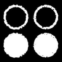 Set of four grunge-style circular frames. Rough, textured white edges. Distressed and aged appearance. Circular shape with edgy design. White frames against a black background. Decorative elements. vector