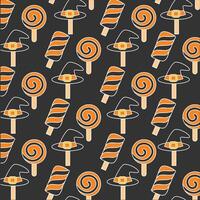 Halloween lollipops and witch hats seamless pattern vector