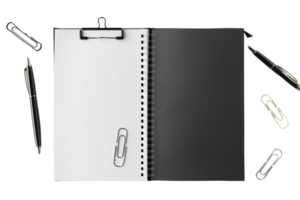 Open notebook with white and black pages surrounded by pens and paper clips, ideal for office or school use. png