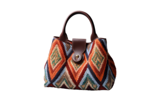 A colorful purse with a brown strap. The purse is made of a variety of colors and has a unique design png